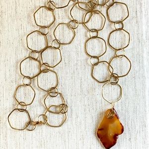 Hammered metal necklace with Amber pendant